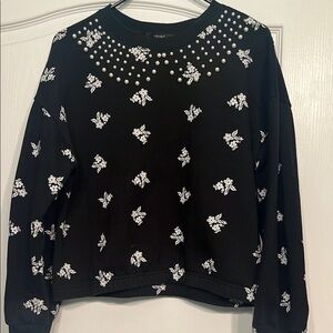 Trendy Black Floral Top with Pearl Accents